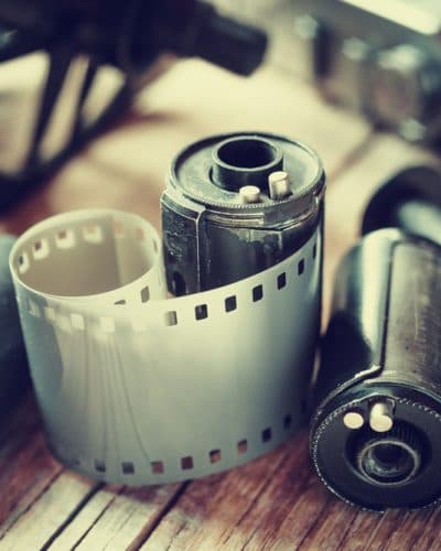 Old,Photo,Film,Rolls,,Cassette,And,Retro,Camera.,Vintage,Stylized.